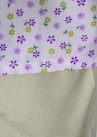 زي عاملة منزلية بطبعة زهور