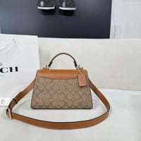 Coach Eliza Top Handle In Signature Canvas