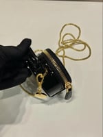 Prada Saffiano Leather Mini-Pouch.