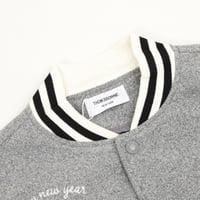 Multi-element embroidered four-bar baseball unifor...