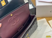 Black Chanel classic flap bag