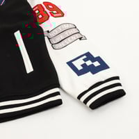 Multi-element embroidered four-bar baseball unifor...