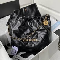 black chanel 22 bag with a gold chain