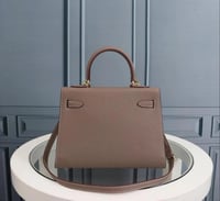 Hermès Pre-Owned Kelly 32 bag in brown leather,