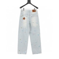 Co-branded candy embroidered denim trousers