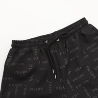 Prada 25SS full print letter logo beach shorts