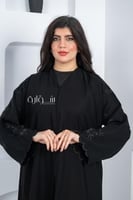 عباية ملكي بتطريز حلزوني