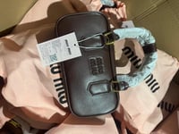 شنط ميو ميو