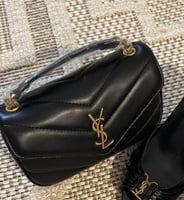 شنطة سان لوران