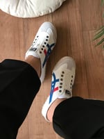 شوزات تايقر