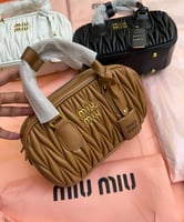 شنط ميو ميو