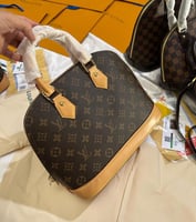 شنط لويس فيتون