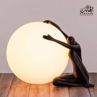 ابجورة طاولة كروي على شكل رجل يبكي