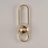 أبليك ذهبي مودرن مع كرة زجاجية مضيئة