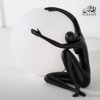 ابجورة طاولة كروي على شكل رجل يبكي