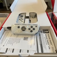 جوي كون مفرد يمين ابيض الاصلي لجهاز نيتيندو سويتش