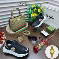 طقم شنطة وشوز ماركة فندي نفس الصورة