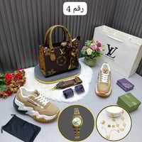 طقم نسائي ماركة لويس فيتون