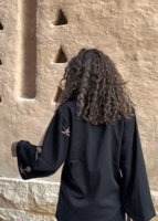 طقم أنيق اسود بمناسبة اليوم الوطني