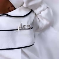 بروش اطفال مواليد لون فضي بالاسم