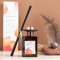 فواحة عطر بالأعواد في حامل زجاجي برائحة الزهرة الم...