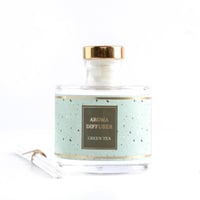 فواحة عطر بالأعواد في حامل زجاجي برائحة الشاي الأخ...