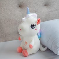 لعبة أطفال على شكل حيوان اليونيكورن مصنوع من القطي...