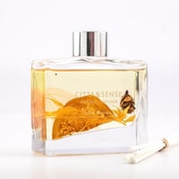 فواحة عطر بالأعواد في حامل زجاجي برائحة اليوسفي وا...