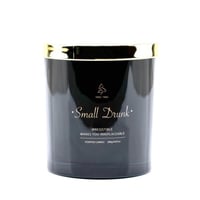 شمعة معطرة في حامل زجاجي بغطاء معدني برائحة نسيم ا...