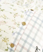 مفرش إنسجام صيفي قطن كريمي برسومات الزهور