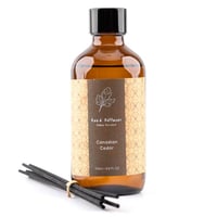 فواحة عطر بالأعواد في حامل زجاجي برائحة الأرز الكن...