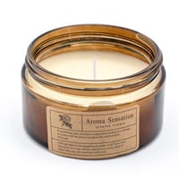 شمعة معطرة في حامل زجاجي بغطاء معدني برائحة الورود