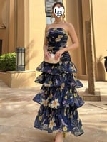 فستان أسود بتصميم بليزر و تنورة بليسيه