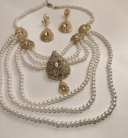 طقم الكرستال الذهبي