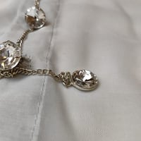 ازارير الكرستالة الفضية