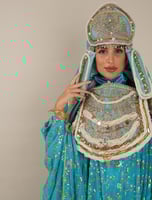 لبس المديني السماوي للعروسه