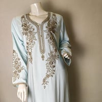 جلابية مطرزه سماوي