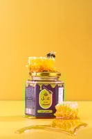 عسل الأزهار المتبلور الطبيعي نصف كيلو