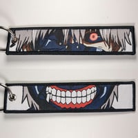 ميدالية طوكيو غول ، صورة مختلفة لكل وجه.