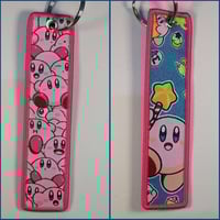 ميدالية كيربي ، صورة مختلفة لكل وجه.