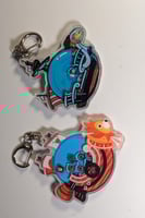 ميدالية ون بيس .(صور لطاقم داخل الميدالية)