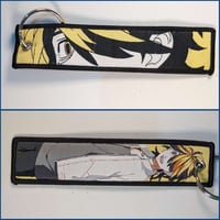 ميدالية طوكيو ريفينجر، صورة مختلفة لكل وجه.