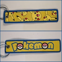 ميدالية بيكاتشو ، صورة مختلفة لكل وجه.