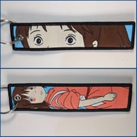 ميدالية ستديو جيبلي ، صورة مختلفة لكل وجه.