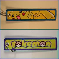 ميدالية بيكاتشو ، صورة مختلفة لكل وجه.