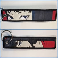 ميدالية جيني إيتو ، صورة مختلفة لكل وجه.