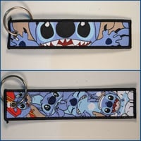 ميدالية ستيتش ، صورة مختلفة لكل وجه.