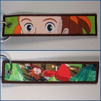 ميدالية ستديو جيبلي، صورة مختلفة لكل وجه.