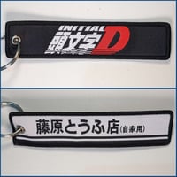 ميدالية إنيشيال دي ، صورة مختلفة لكل وجه.