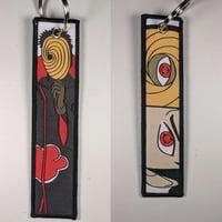 ميدالية أوبيتو أوتشيها من ناروتو ، صورة مختلفة لكل...